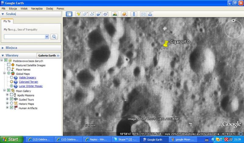 Zainstaloval som si najnovse Google Earth 2010. Vstupil som tam na Mesic, a ustavil na dobru kvalitu. Najsel som ze aj tu v tom krateri je to zahadne cigaro